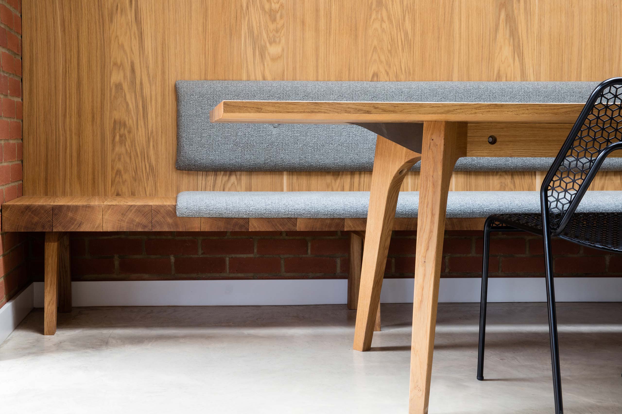 Bespoke solid oak dining table and seating by Six Hands